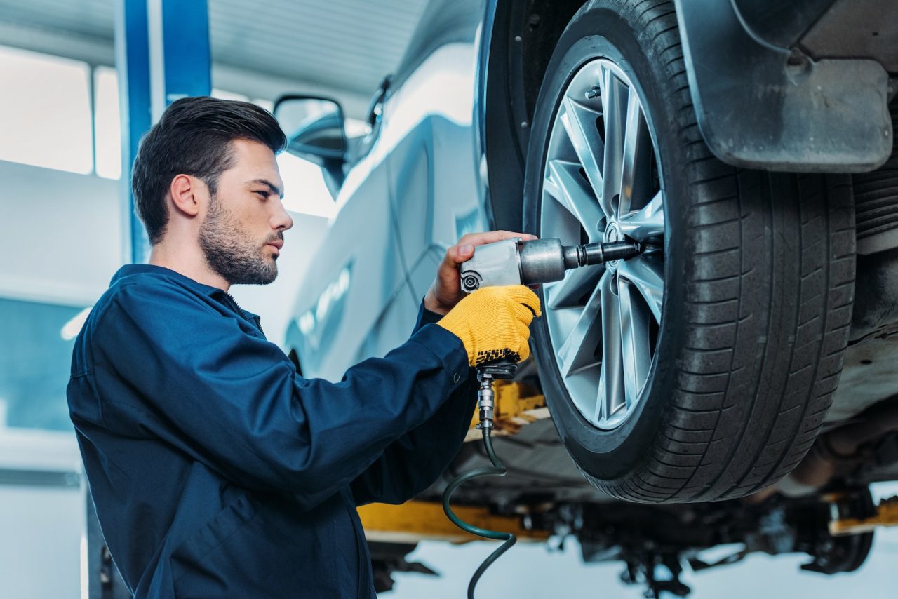 Roadside assistance technician helping a stranded driver